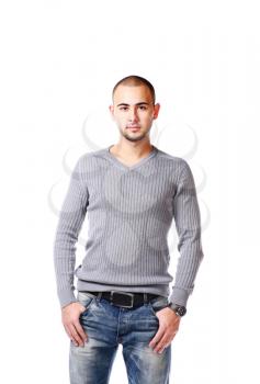 Casual friendly man in jeans and pullover - isolated over a white background