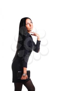 Fashion woman in a black dress isolated over white