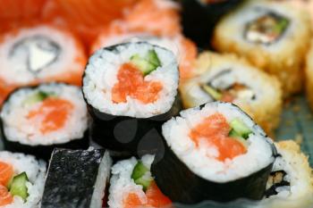 salmon sushi rolles close up low angel shot