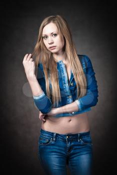 young blonde wearing jeans and jacket