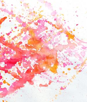 Splattered red watercolor stains on a white background