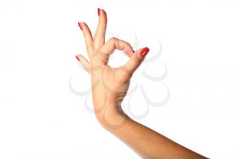 Female hand making OK sign  isolated on white