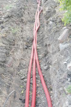 Cable in the trench outdoors