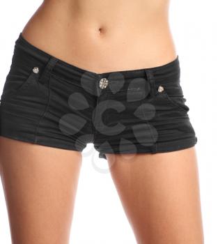 front side of young sexy woman wearing jean shorts studio shot
