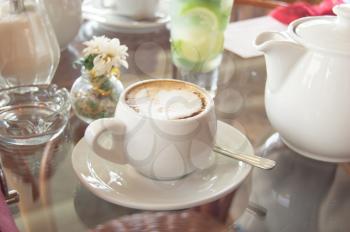 tea cup on the table in diffuse light