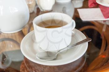 tea cup on the table in diffuse light