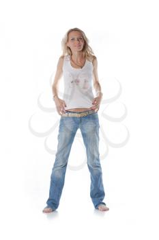 pretty blond women on white background. Weared in jeans and white shirt