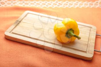 Yellow pepper -Fresh Organic Vegetables on a Wooden Background