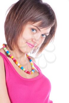 young brunette with a beads on white background