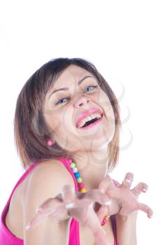 young woman makes a funny face on white studio shot
