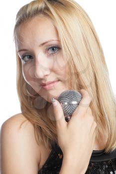 blonde woman holding a retro microphone on white background