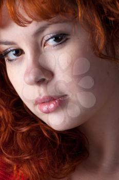 Closeup portrait of beautiful redhead woman