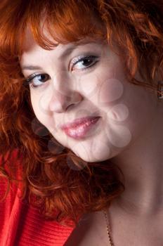 Portrait of beautiful redhead woman
