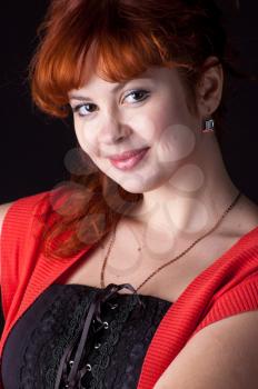 closeup portrait of lovely redhead girl making funny facial expression