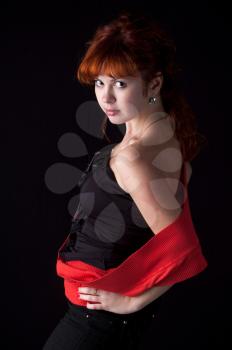 beautiful redhead girl torso shot on black