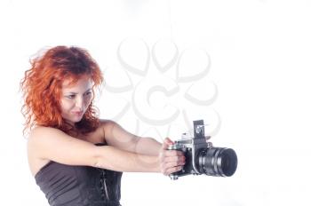 Portrait of a beautiful woman with the camera. Fashion photo