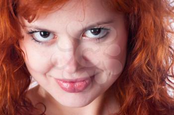 Closeup portrait of a sexy young woman with red hair and natural makeup
