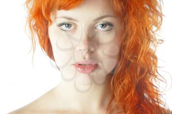 Beautiful Woman with long curly red hair at studio