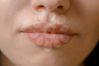 Close up shoot of young beautiful girl with perfect skin: makeup mouth zone. Lips.
