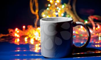 cup of tea and christmas garland, holiday concept