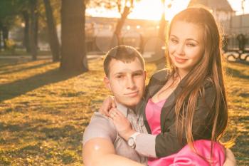 Couple together outdoors in a city park