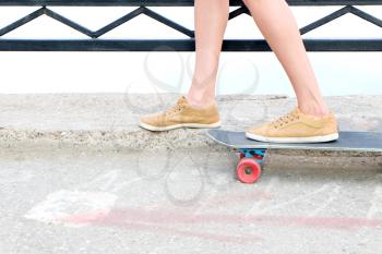 Skateboarder feet closeup shot with a lot of copyspace
