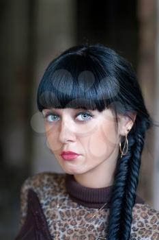 Black haired women with braid fashion style outdoors