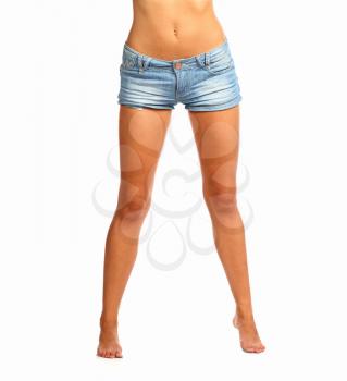 Woman in jeans texas shorts. Young tanned woman wearing blue short jean on white background