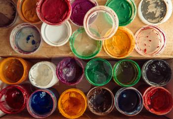 Gouache paint jars. Tools for creative work. Paintings Art Concept. Above view.