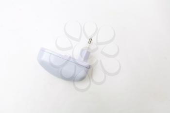 Modern usb charger on white background with copyspace