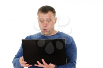 Royalty Free Photo of a Man Holding a Laptop