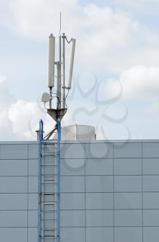 Royalty Free Photo of a Cellular Antenna on a Building