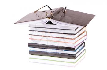 Royalty Free Photo of Glasses on a Stack of Book