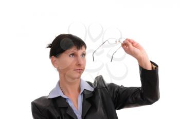 Royalty Free Photo of a Businesswoman Looking at Her Glasses