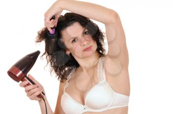 Royalty Free Photo of a Woman Using a Hairdryer 