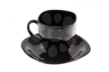 black cup and saucer isolated on white background