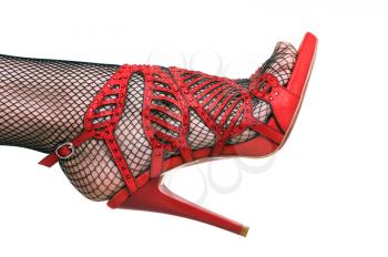 Royalty Free Photo of a Woman's Leg Wearing a High Heel