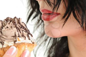 Royalty Free Photo of a Woman Eating Cake