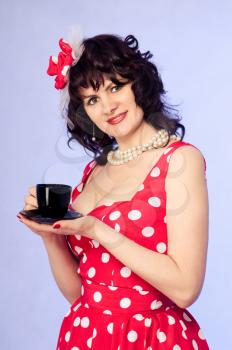 Royalty Free Photo of a Woman in a Polka Dot Dress