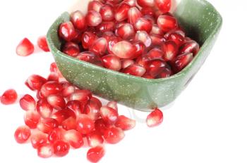 Royalty Free Photo of Pomegranate Grains in a Bowl