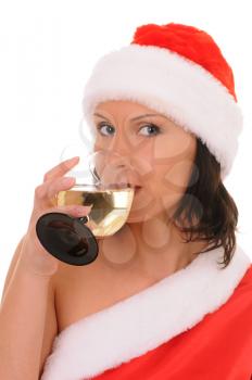 Royalty Free Photo of a Woman Wearing a Santa Hat Drinking