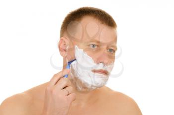Royalty Free Photo of a Man Shaving