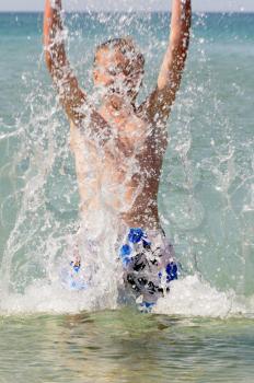 Royalty Free Photo of a Teenager in Water