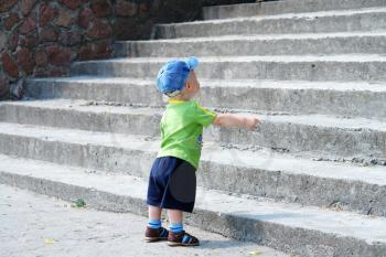 Royalty Free Photo of a Child at a Stairway
