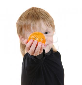 Royalty Free Photo of a Child Holding an Orange