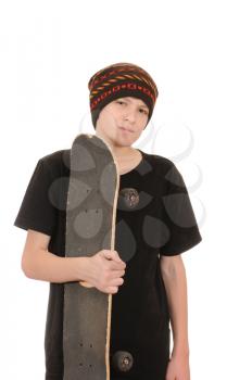 Royalty Free Photo of a Teenager With a Skateboard