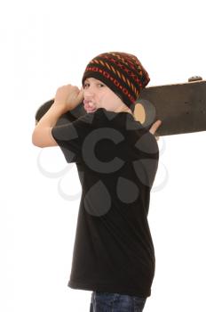 Royalty Free Photo of a Teenager With a Skateboard