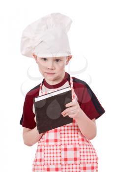 child chef writing something isolated on white background