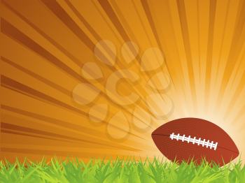 Royalty Free Clipart Image of a Football on Grass