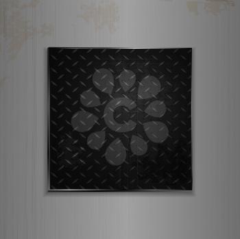 metallic black diamond plate on a brushed metal background